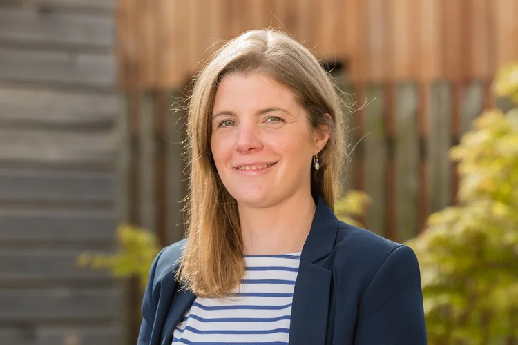 Steph Bridgeman, founder of Experienced Media Analysts, in a blue blazer outdoors